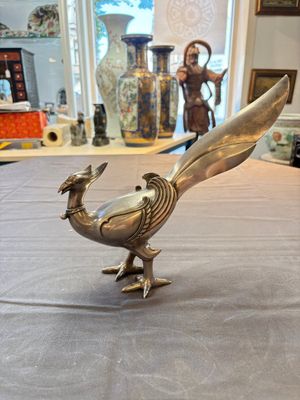 A fine Japanese silver phoenix, made by Toshihiko 敏彥造, silver 銀製 mark, Meiji/Taisho, 19/20th C. — photo 1