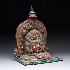 A fine large Nepalese red coral and precious stone-inset brass and silver filigree 'Bhairava' mask, 19th C. — photo 1