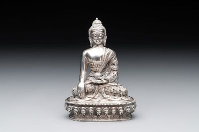 A fine Nepalese silver Buddha, 20th C.