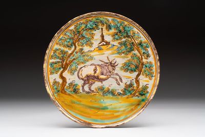 A fine polychrome Spanish pottery tazza with a leaping bull, Talavera, 18th C.