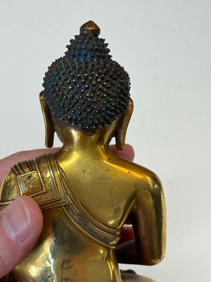A fine Sino-Tibetan gilt-bronze figure of Buddha Shakyamuni, 17th C. — photo 25