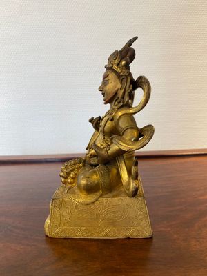 A fine Sino-Tibetan gilt bronze sculpture of Jambhala, 18th C. — 照片 4