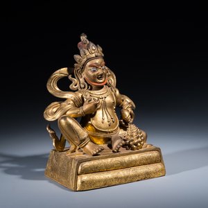A fine Sino-Tibetan gilt bronze sculpture of Jambhala, 18th C. — 照片 1