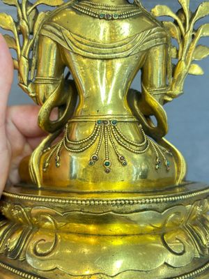 A fine Sino-Tibetan turquoise- and coral-inlaid gilt-bronze Buddha Maitreya, Kangxi — 照片 12