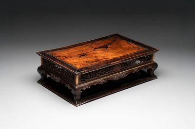 A finely carved Chinese hardwood stand, Qing