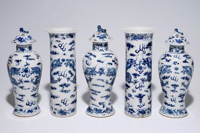 A five-piece Chinese blue and white garniture with dragons, 19th C.