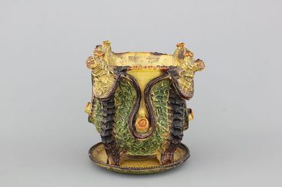 A Flemish pottery, Torhout, flower pot and stand.