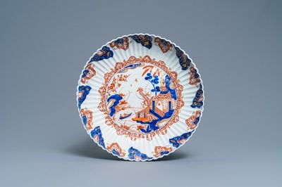 A fluted Dutch Delft doré chinoiserie dish with a pagoda in a landscape, 1st quarter 18th C.