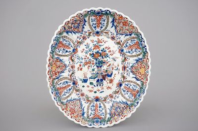 A fluted oval Dutch Delft dish in cashmere palette, ca. 1700