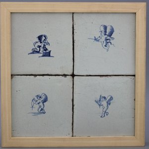 A framed set of 4 Dutch Delft tiles with amors 17th C. — photo 1