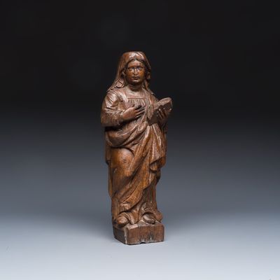A French carved oak 'Virgin Mary at the Annunciation' figure, 16th C.