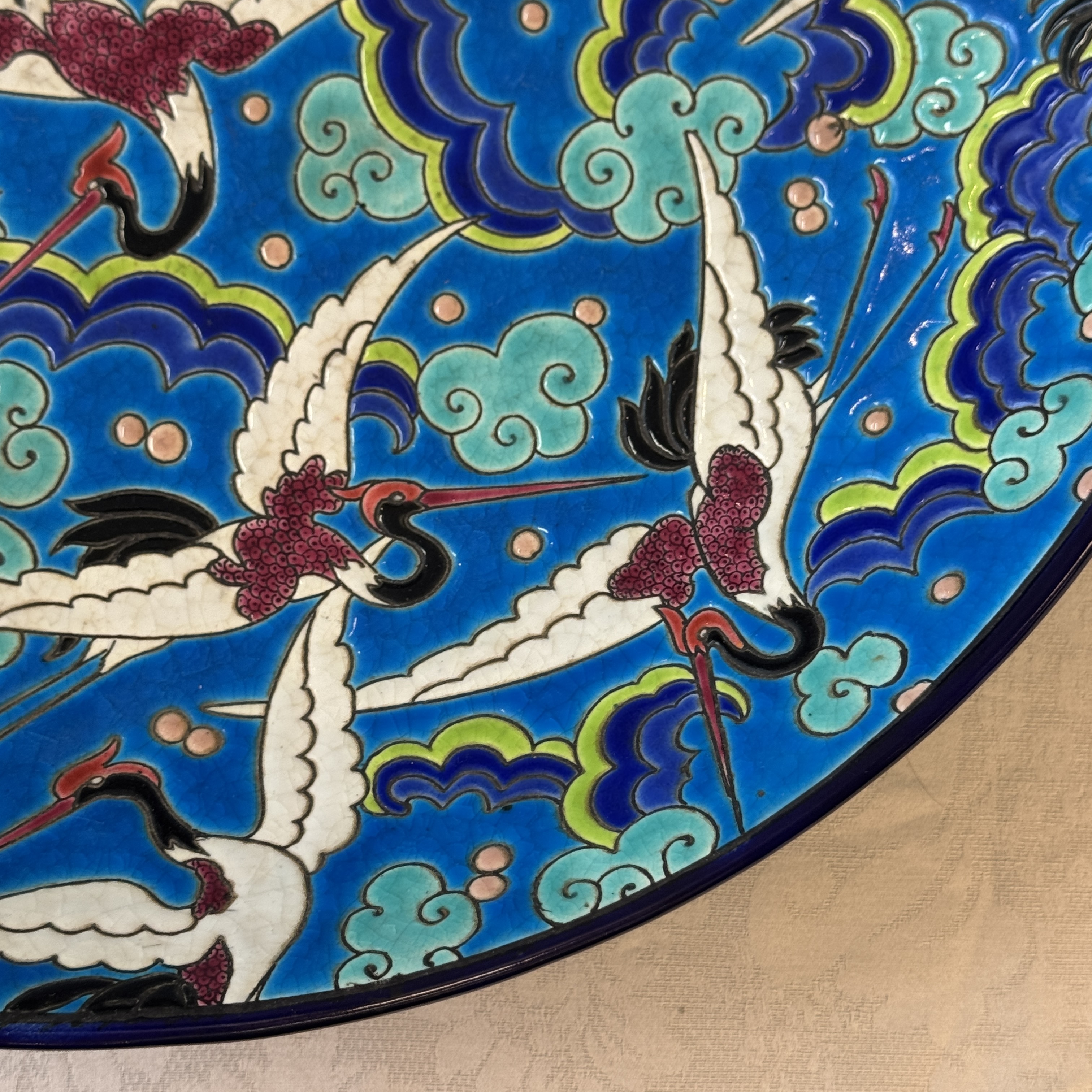 A French polychrome enamelled Longwy 'Cranes among Clouds' charger — photo 7