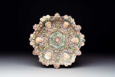 A French polychrome relief-moulded dish in the manner of Palissy, 17th C.