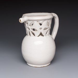 A French white-glazed puzzle jug, Nevers, 18th C. — photo 1