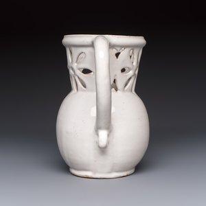 A French white-glazed puzzle jug, Nevers, 18th C. — photo 3