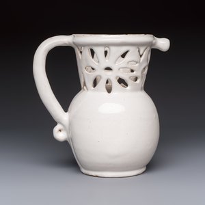 A French white-glazed puzzle jug, Nevers, 18th C. — photo 4