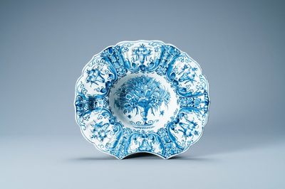 A gadrooned Dutch Delft blue and white shaving bowl, 18th C.