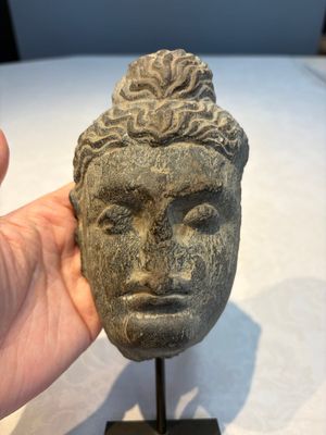 A Gandhara grey schist relief fragment of a Bodhisattva head, 3rd/4th C. — photo 2