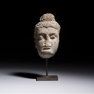 A Gandhara grey schist relief fragment of a Bodhisattva head, 3rd/4th C. — photo 1