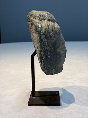 A Gandhara grey schist relief fragment of a Bodhisattva head, 3rd/4th C. — photo 2