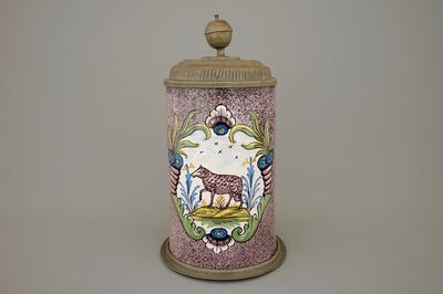 A German faience pewter-mounted beer stein with a sheep, 18th C.