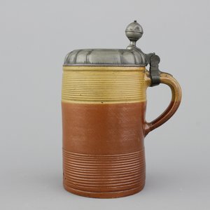 A German stoneware pewter-mounted beer stein, 18th C. — photo 1