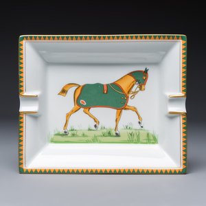 A gilt and polychrome-decorated porcelain 'Horse' ashtray, Hermès, 20th C. — photo 1