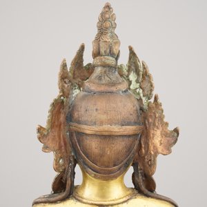 A gilt bronze coral and turquoise inlaid figure of buddha Amoghasiddi, 18/19th C. — photo 11