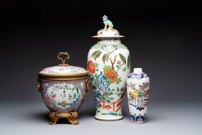 A gilt-bronze mounted famille rose-style covered bowl and two vases, one with cover, Samson, Paris, 19th C.