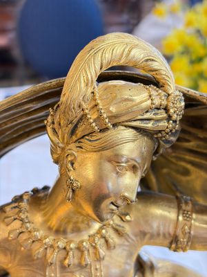 A gilt-bronze 'Oriental Beauty Reclining on a Lion Skin' mantel clock, France, first quarter 19th C. — photo 2
