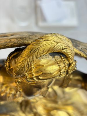 A gilt-bronze 'Oriental Beauty Reclining on a Lion Skin' mantel clock, France, first quarter 19th C. — photo 23