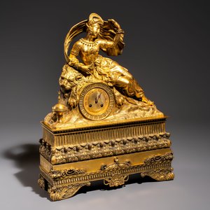 A gilt-bronze 'Oriental Beauty Reclining on a Lion Skin' mantel clock, France, first quarter 19th C. — photo 1