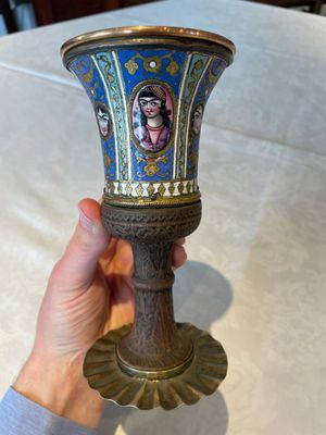 A gilt copper and enamelled water pipe base on wooden stand, Qajar, Iran, 19th C. — 照片 1