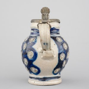 A globular Westerwald stoneware jug with appliques and pewter lid, dated 1689 — photo 3