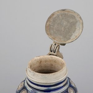 A globular Westerwald stoneware jug with appliques and pewter lid, dated 1689 — photo 6