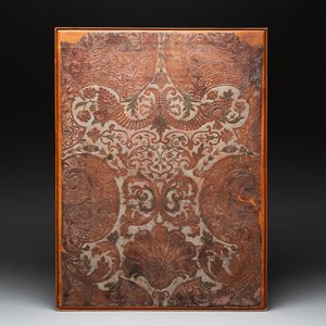 A gold leather fragment with floral design mounted on a wooden panel, Mechelen, 18th C. — photo 1