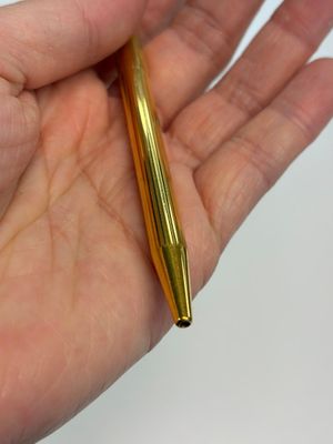 A gold-plated twist ballpoint pen and a fountain pen with an 18kt gold nib, S.T. Dupont Paris, France, 20th C. — photo 12
