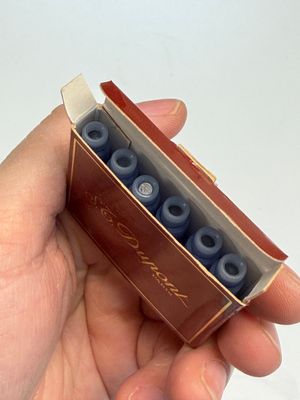 A gold-plated twist ballpoint pen and a fountain pen with an 18kt gold nib, S.T. Dupont Paris, France, 20th C. — photo 15