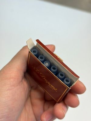 A gold-plated twist ballpoint pen and a fountain pen with an 18kt gold nib, S.T. Dupont Paris, France, 20th C. — photo 16