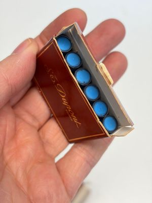 A gold-plated twist ballpoint pen and a fountain pen with an 18kt gold nib, S.T. Dupont Paris, France, 20th C. — photo 17