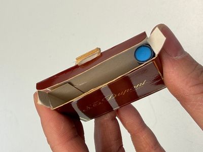 A gold-plated twist ballpoint pen and a fountain pen with an 18kt gold nib, S.T. Dupont Paris, France, 20th C. — photo 18