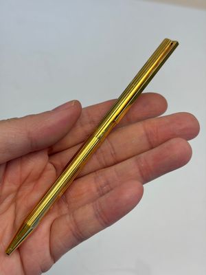A gold-plated twist ballpoint pen and a fountain pen with an 18kt gold nib, S.T. Dupont Paris, France, 20th C. — photo 10