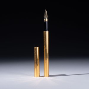 A gold-plated twist ballpoint pen and a fountain pen with an 18kt gold nib, S.T. Dupont Paris, France, 20th C. — photo 4
