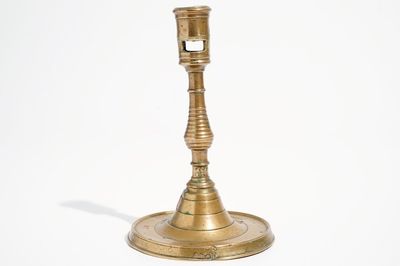 A gothic bronze candlestick, Low Countries, 16th C.