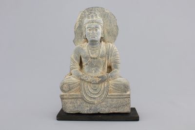 A gray schist figure of a seated Buddha, Gandhara, prob. 2nd/3rd C.