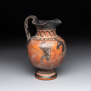 A Greek terracotta 'Oenochoe' vase with Hephaestus and Silenus, Roman era — photo 1