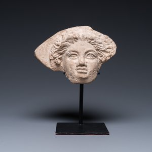 A Greek terracotta with white engobe antefix in the shape of a woman's head, 5/4th C. b.C. — photo 2