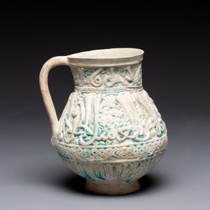 A green-glazed and a turquoise-glazed Kashan jug, Persia, 12/13th C. — photo 10