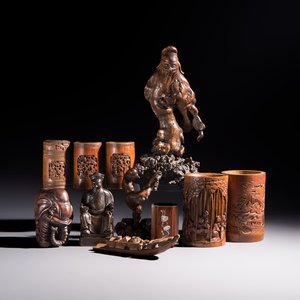 A group of 11 Chinese carved bamboo and wooden works, 19/20th C. — photo 1