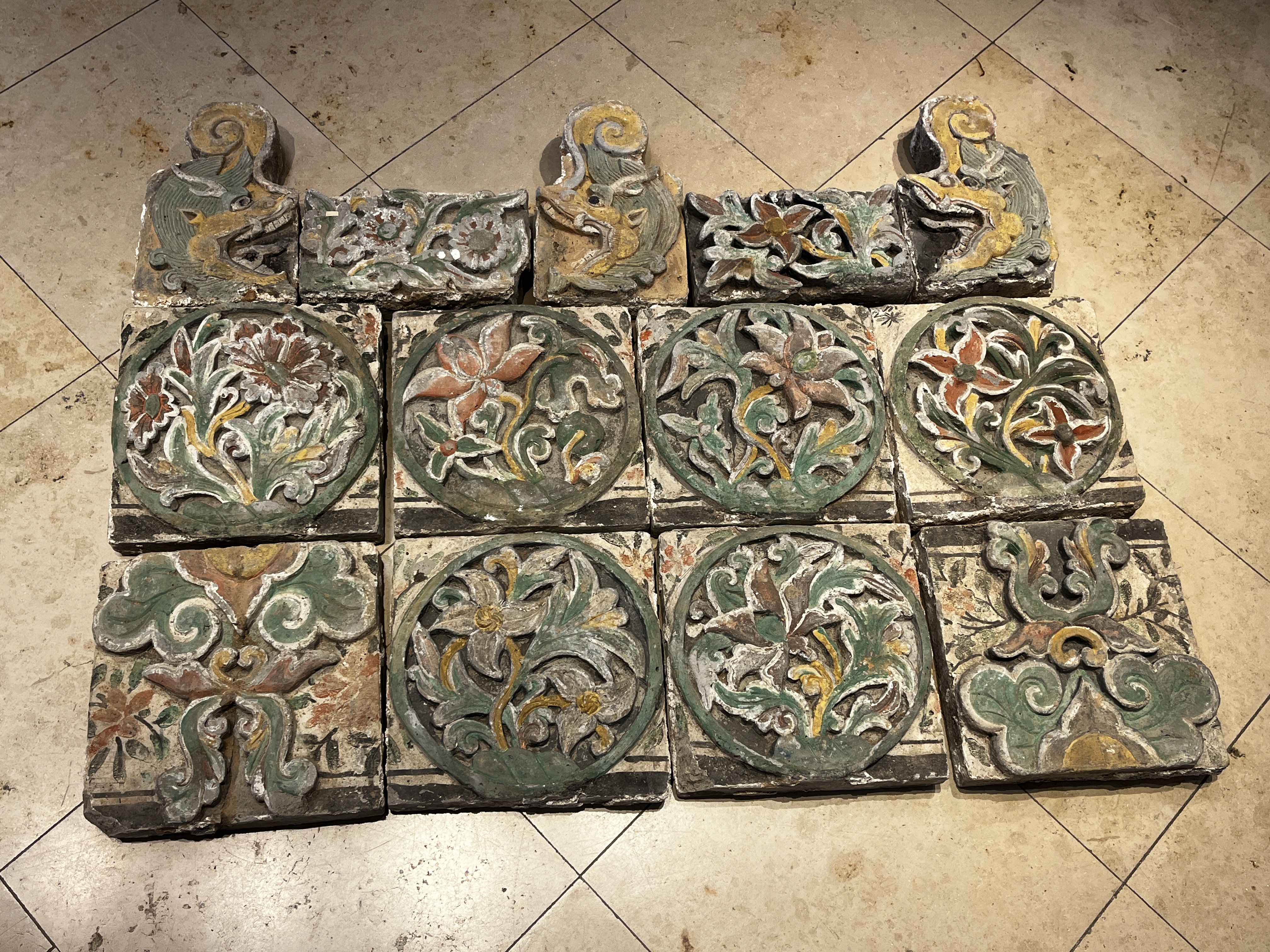 A group of 13 Chinese painted pottery relief tiles  — photo 1